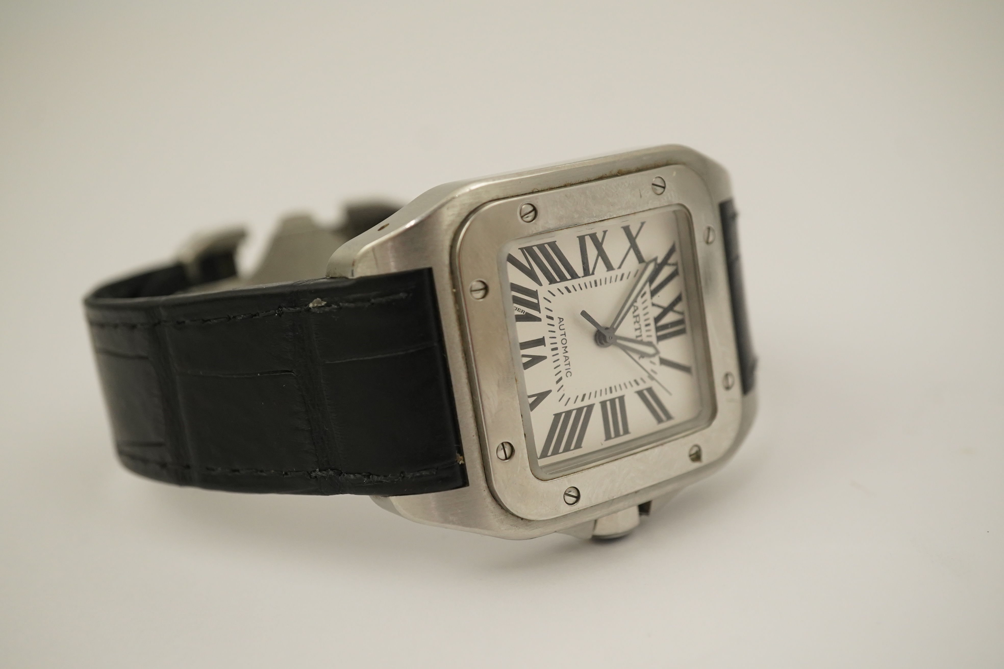 A gentleman's late 20th century stainless steel Cartier Santos 100 automatic wrist watch